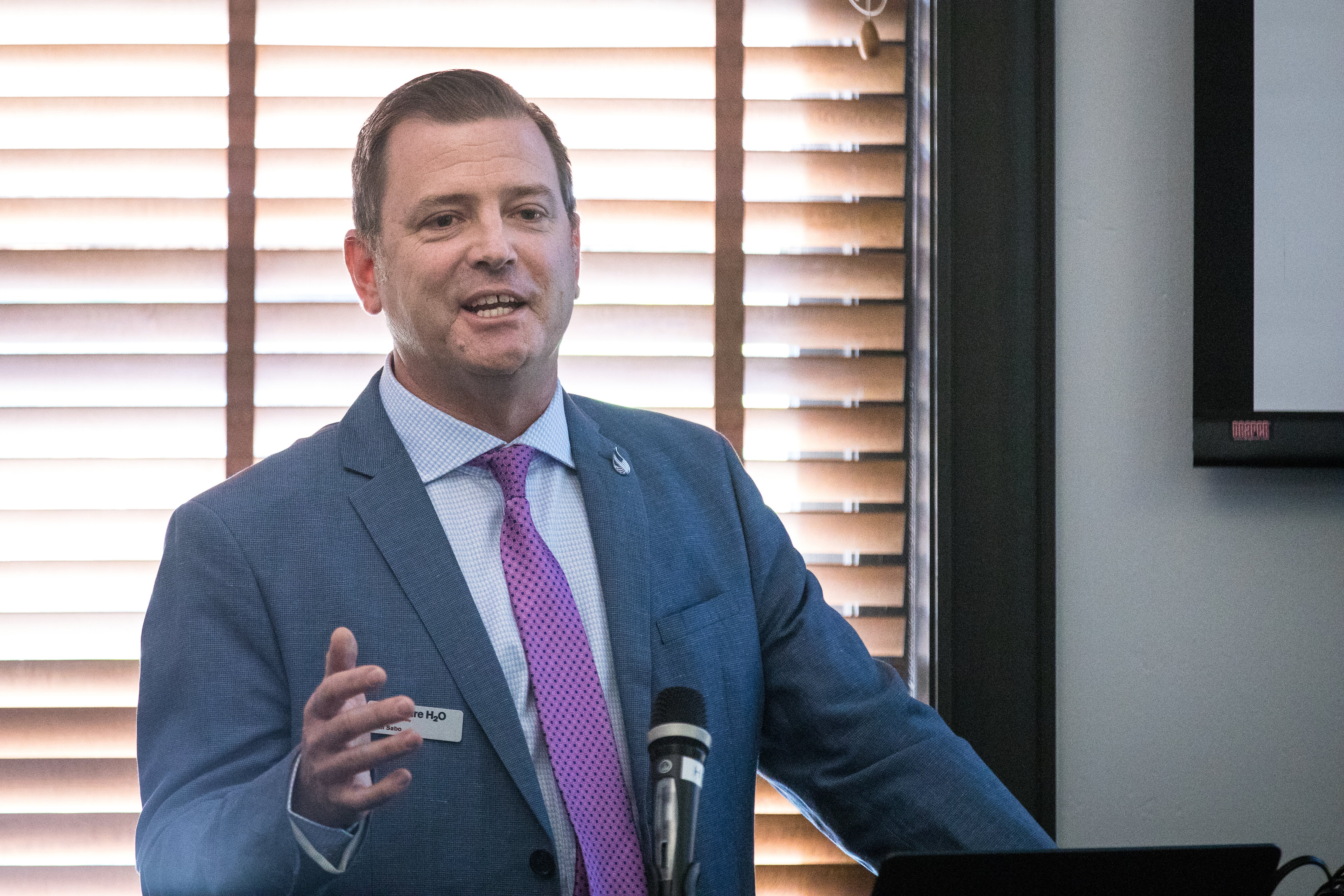 man speaking at event