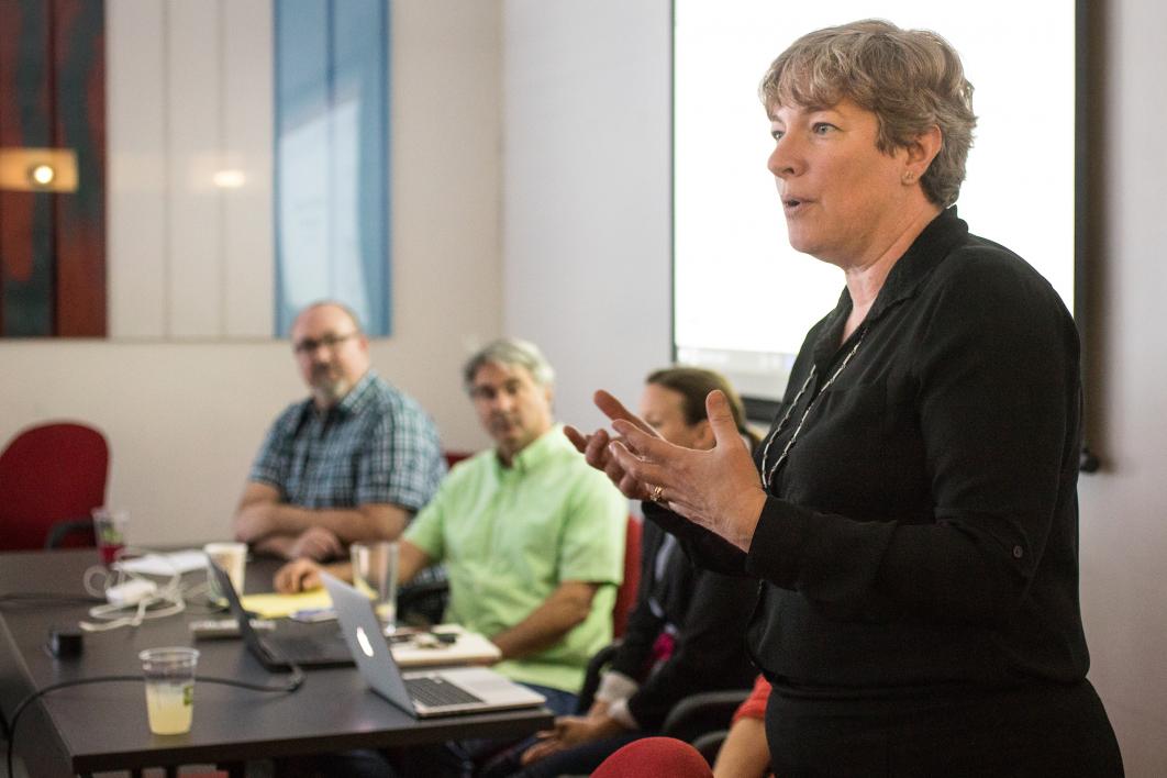 woman speaking to a classroom