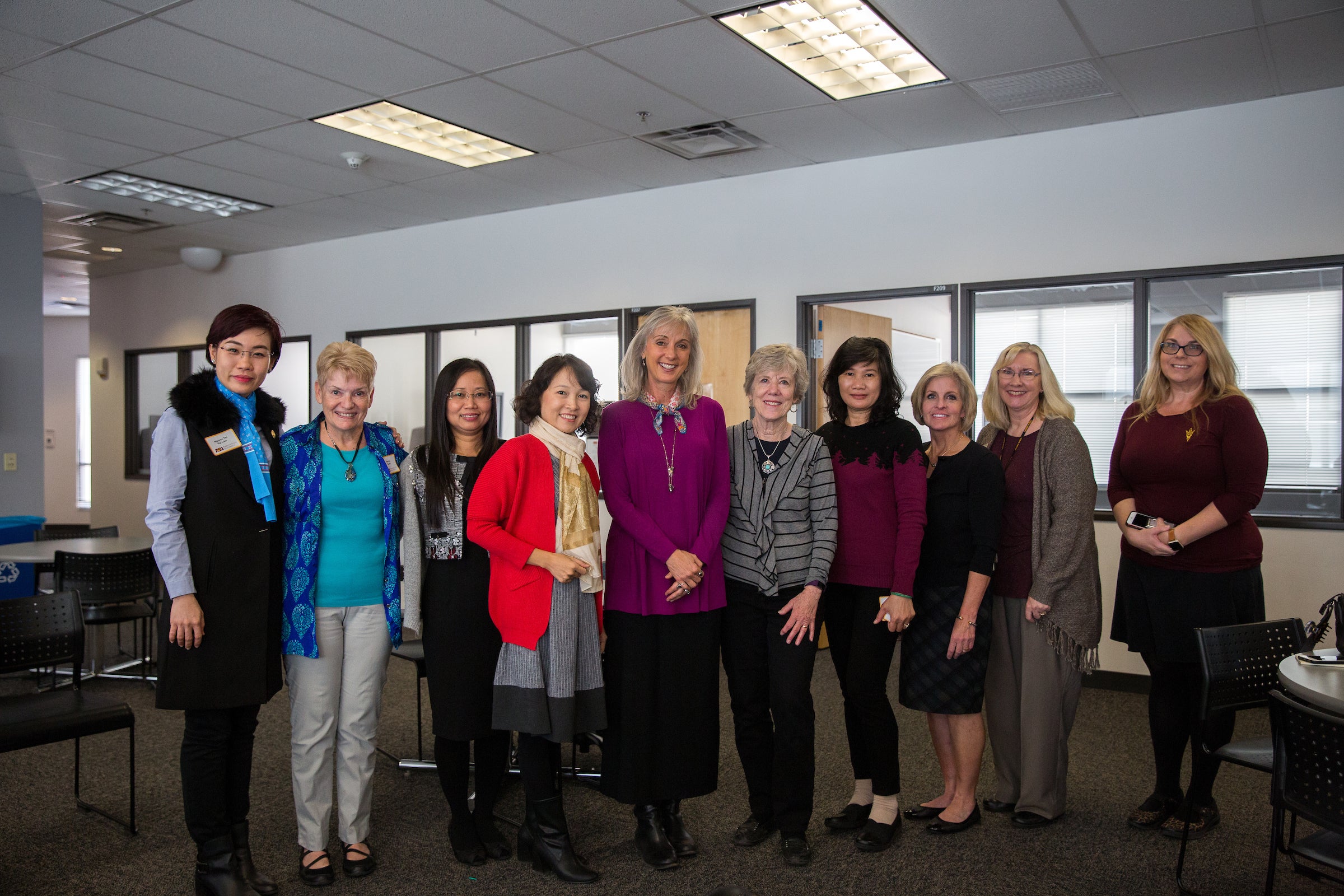 Nurse educators from Vietnam pose with CONHI Dean Teri Pipe 