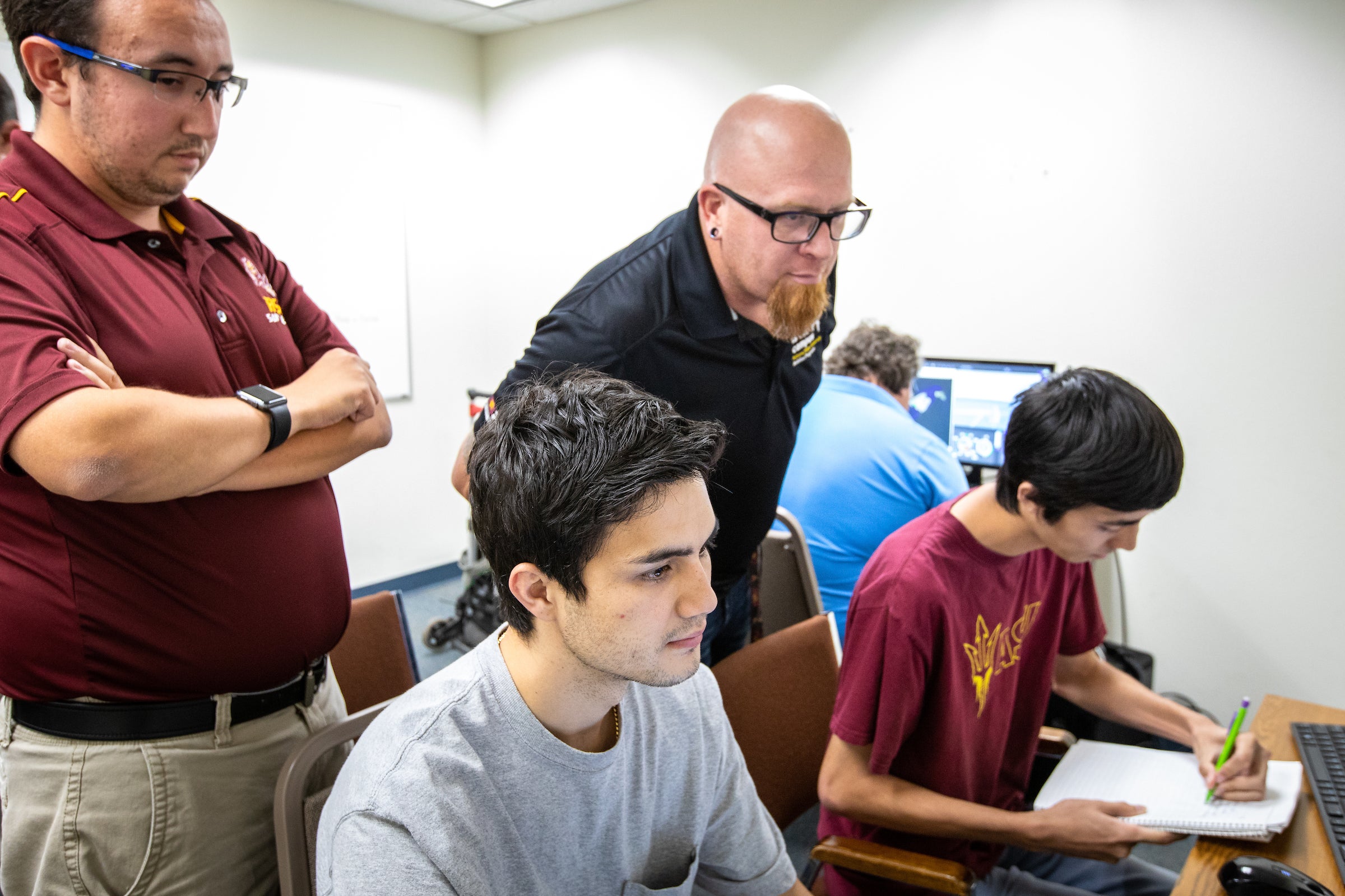 Drone-pilot students work on a class mission