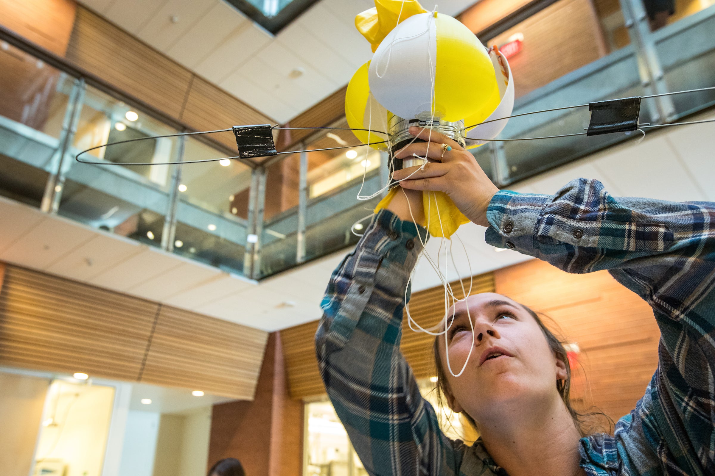 Victoria Froh checks the parachute in her team's planetary lander