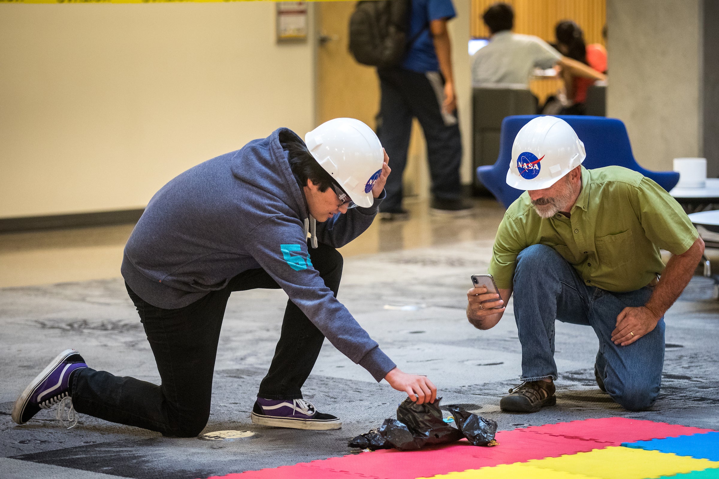 Alexander Elledge, freshman in Astrophysics, left, along with Professor Phil Christensen