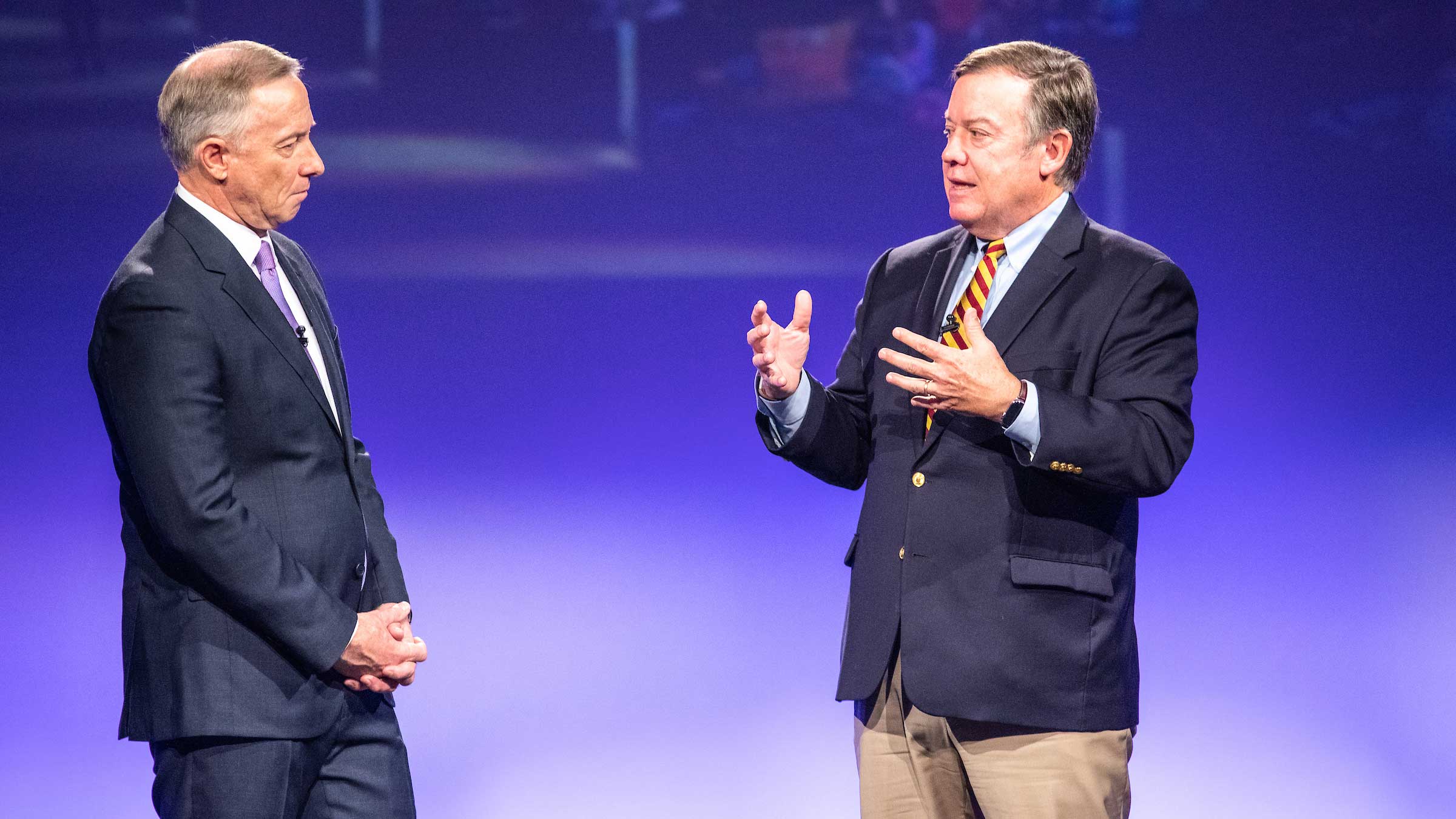 Mesa Mayor John Giles and ASU President Michael Crow speak onstage