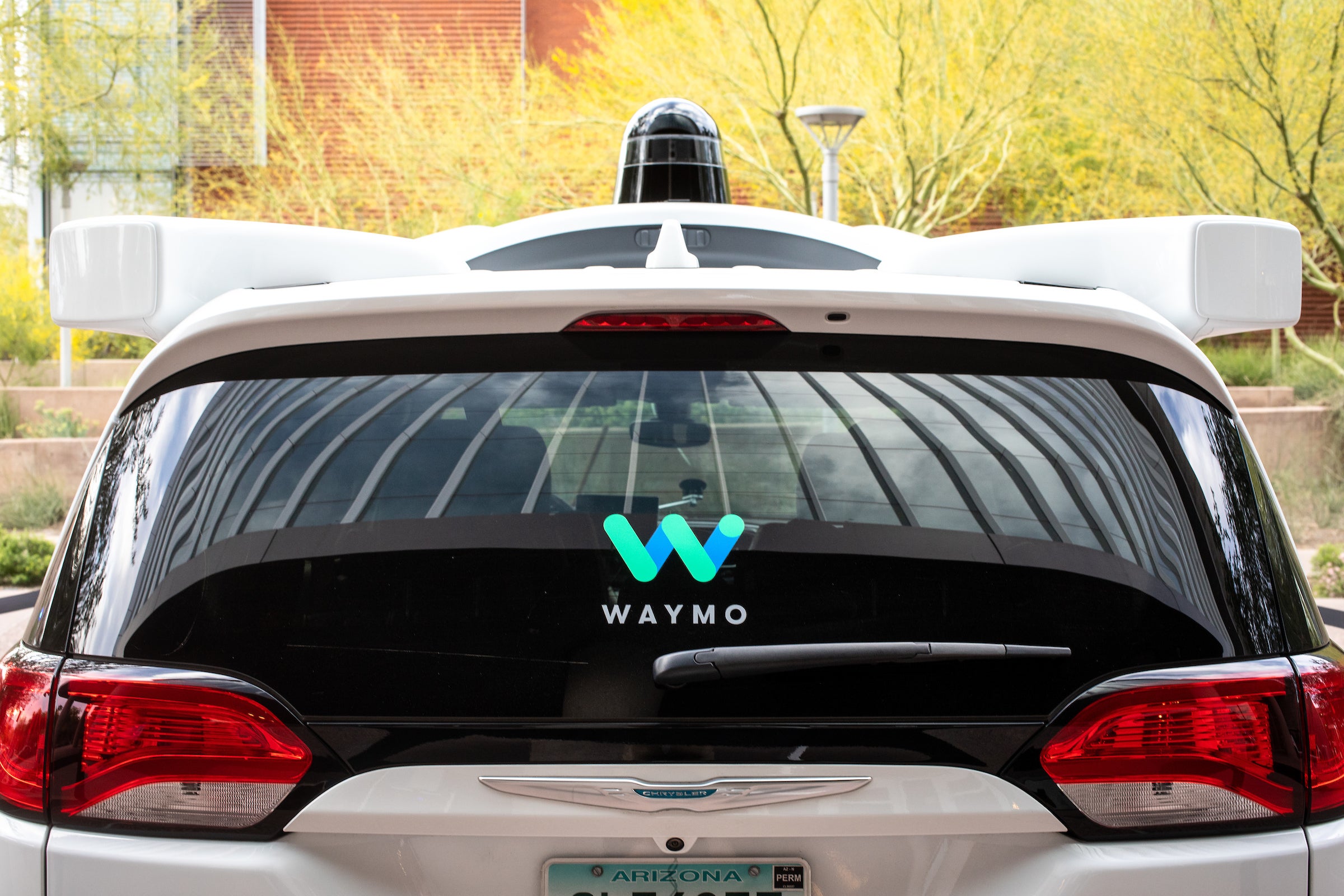 back of self-driving Waymo car