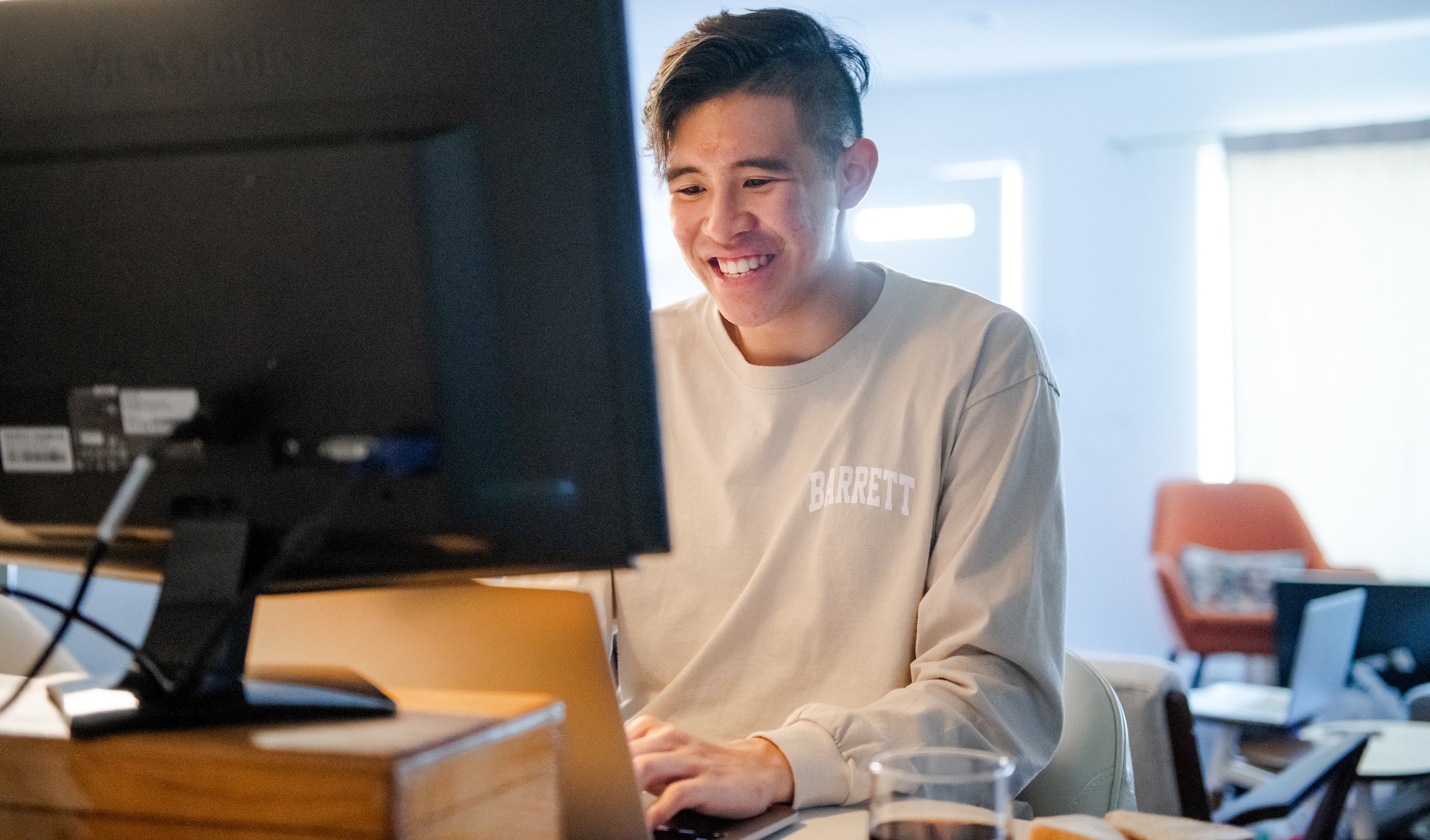 Student works on a laptop 