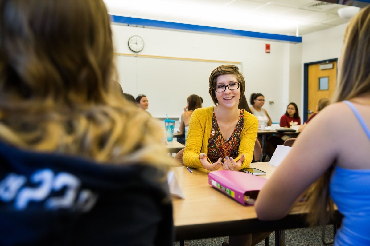 Woman in a class.