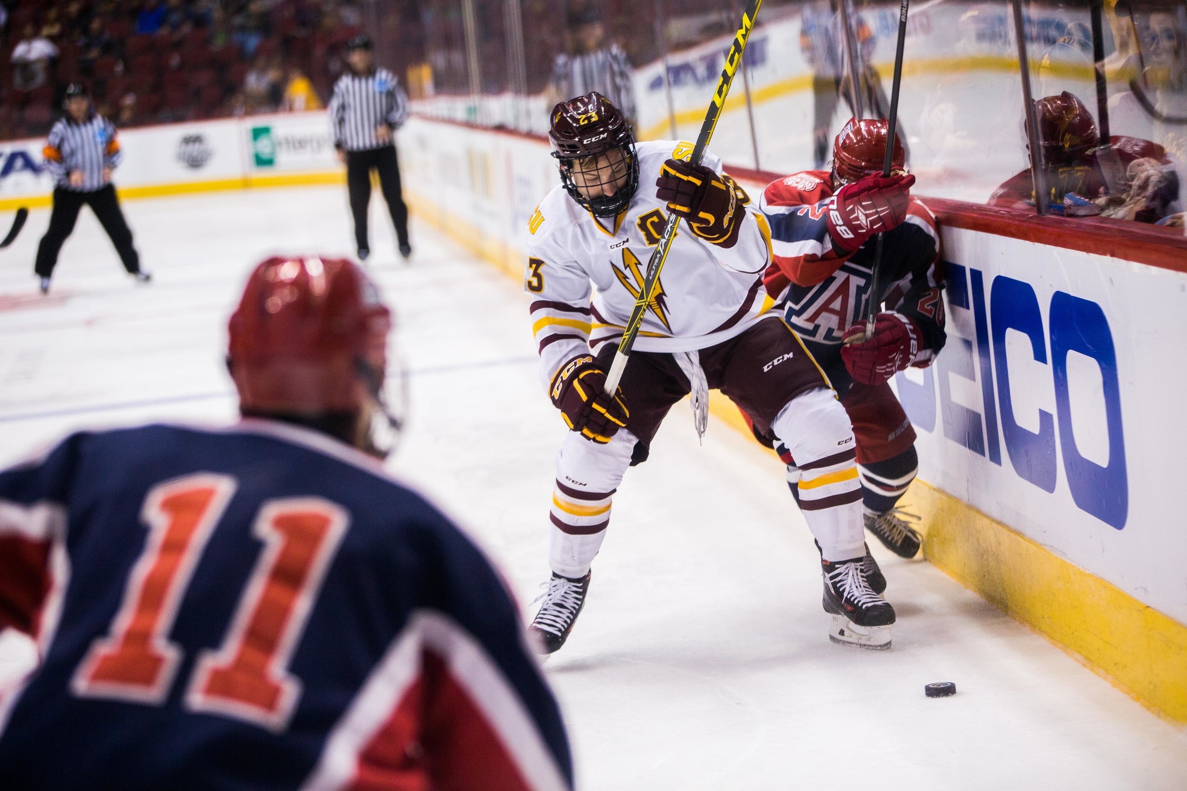 Senior defender Jordan Young battles for the puck.