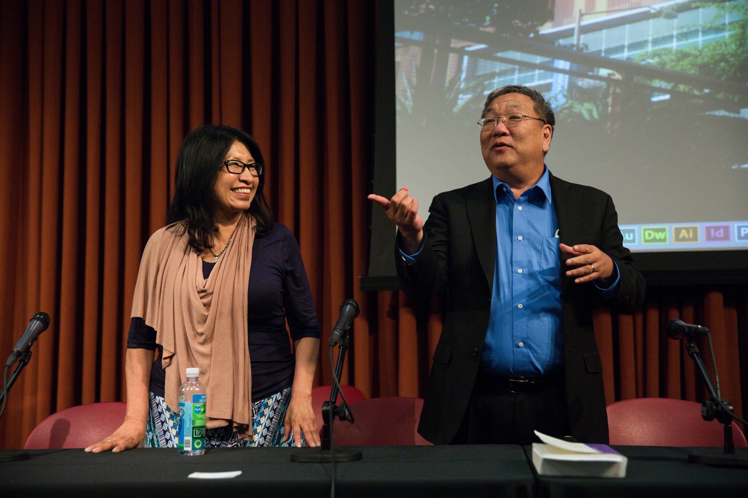 two people talking at conference