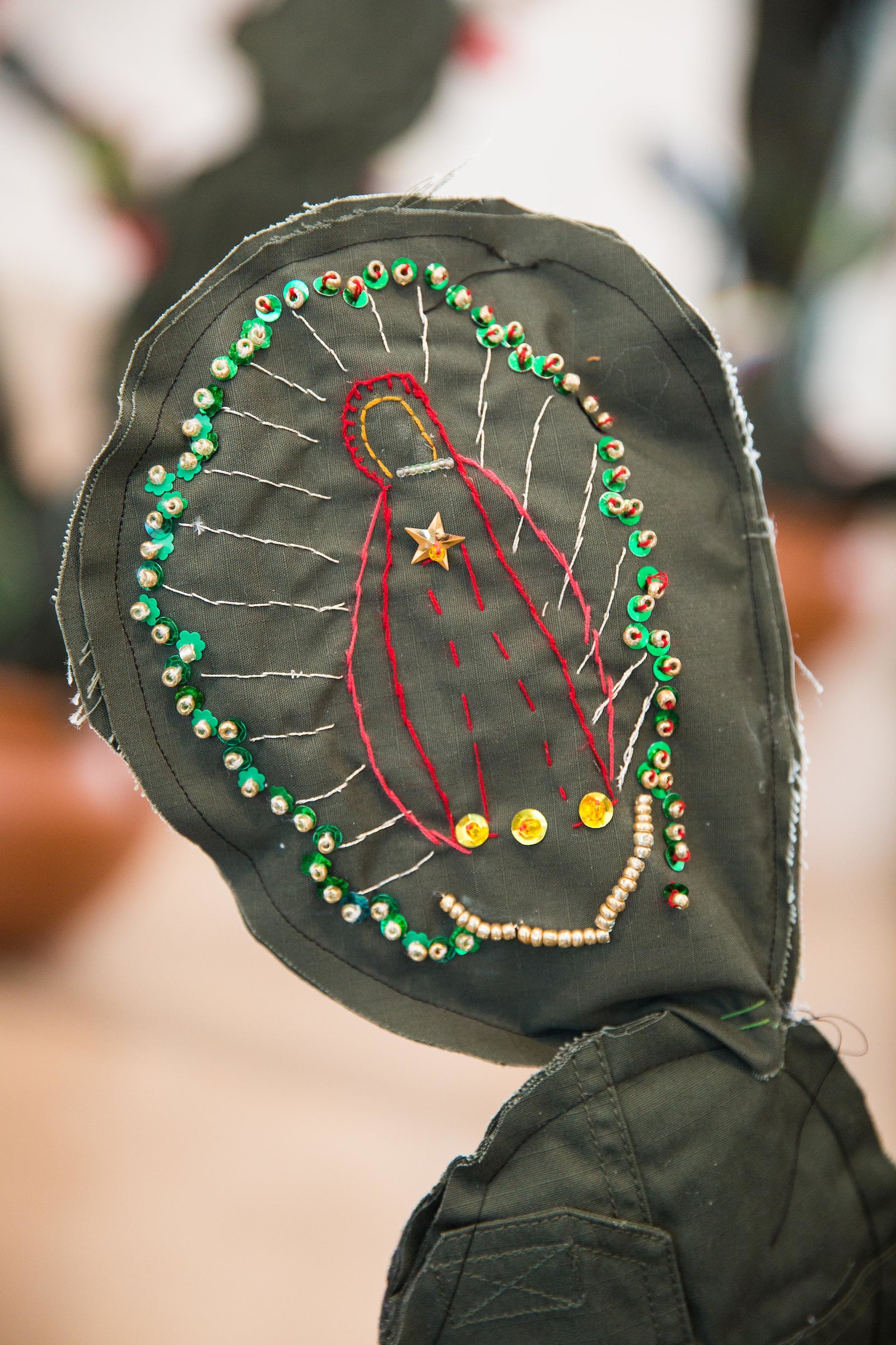 The Virgin de Guadalupe embroidered on a cloth cactus