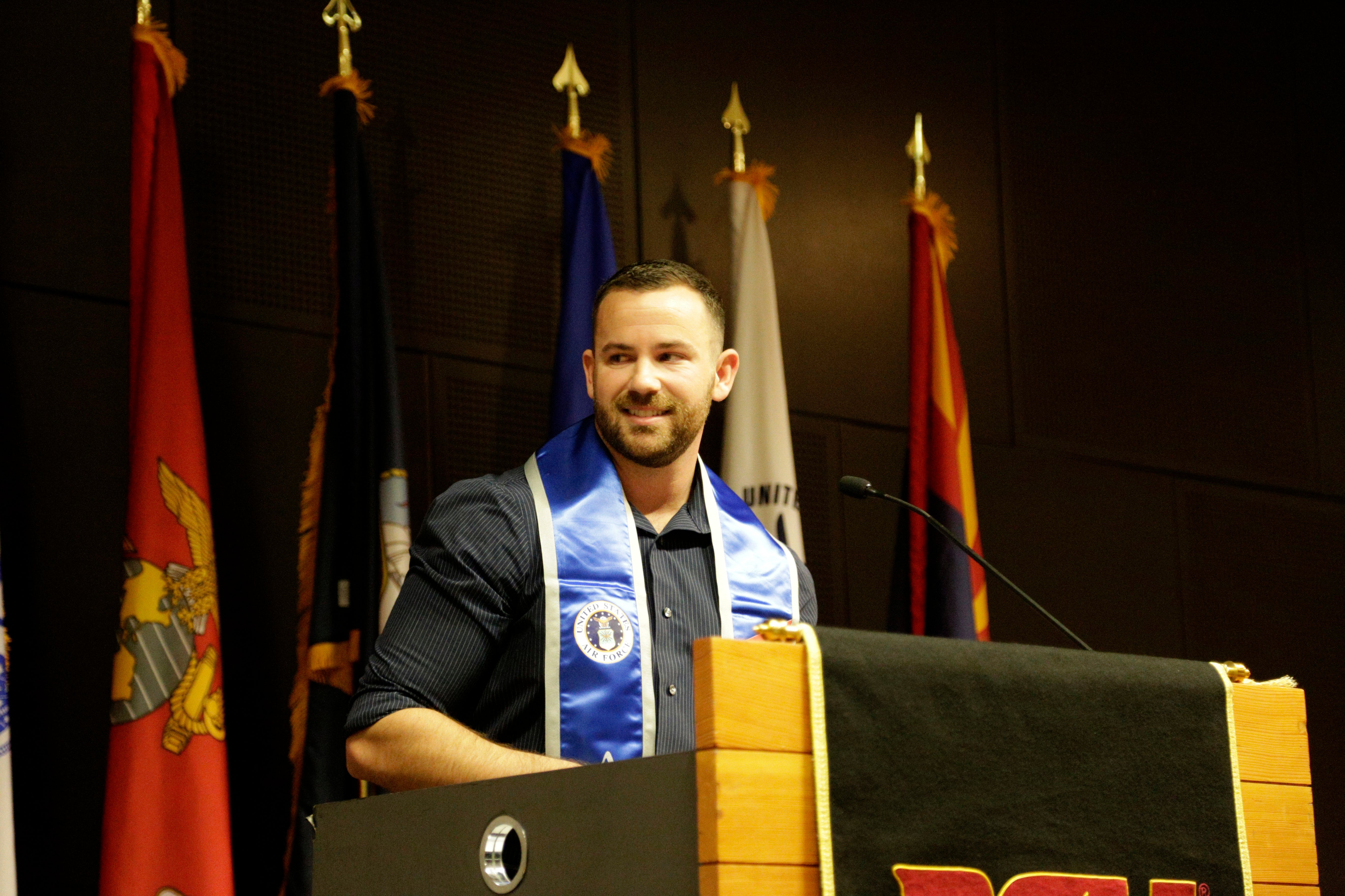 student speaking at ceremony