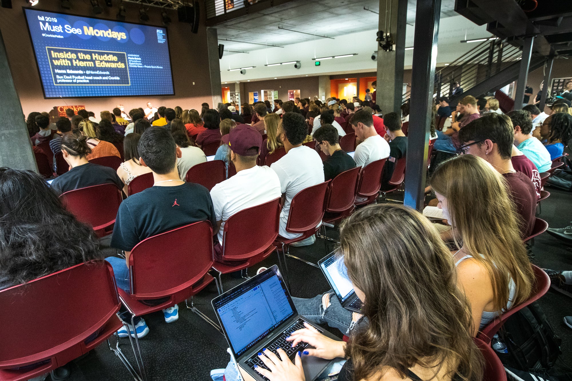 Students attending a speaker series.