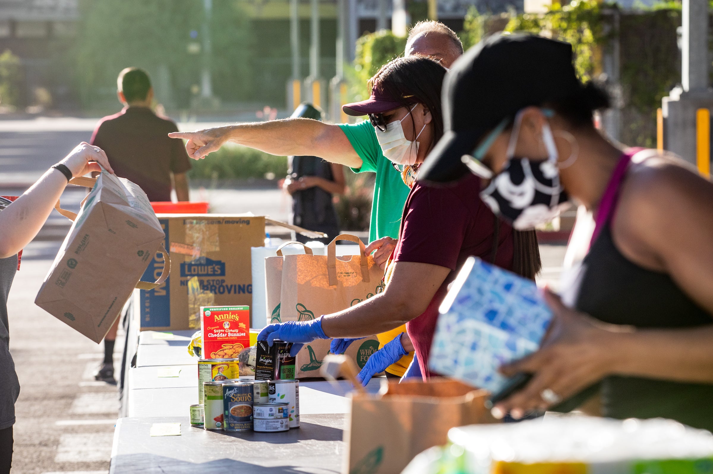 Volunteers sort donations at the First People's Resource Drive