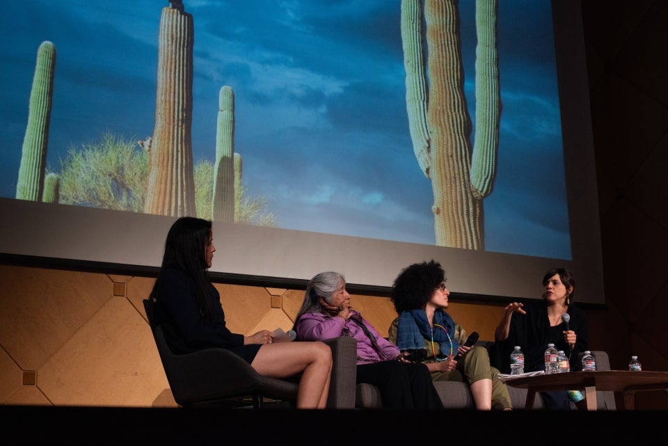 people talking on stage at the launch of ASU's Center for Imagination in the Borderlands