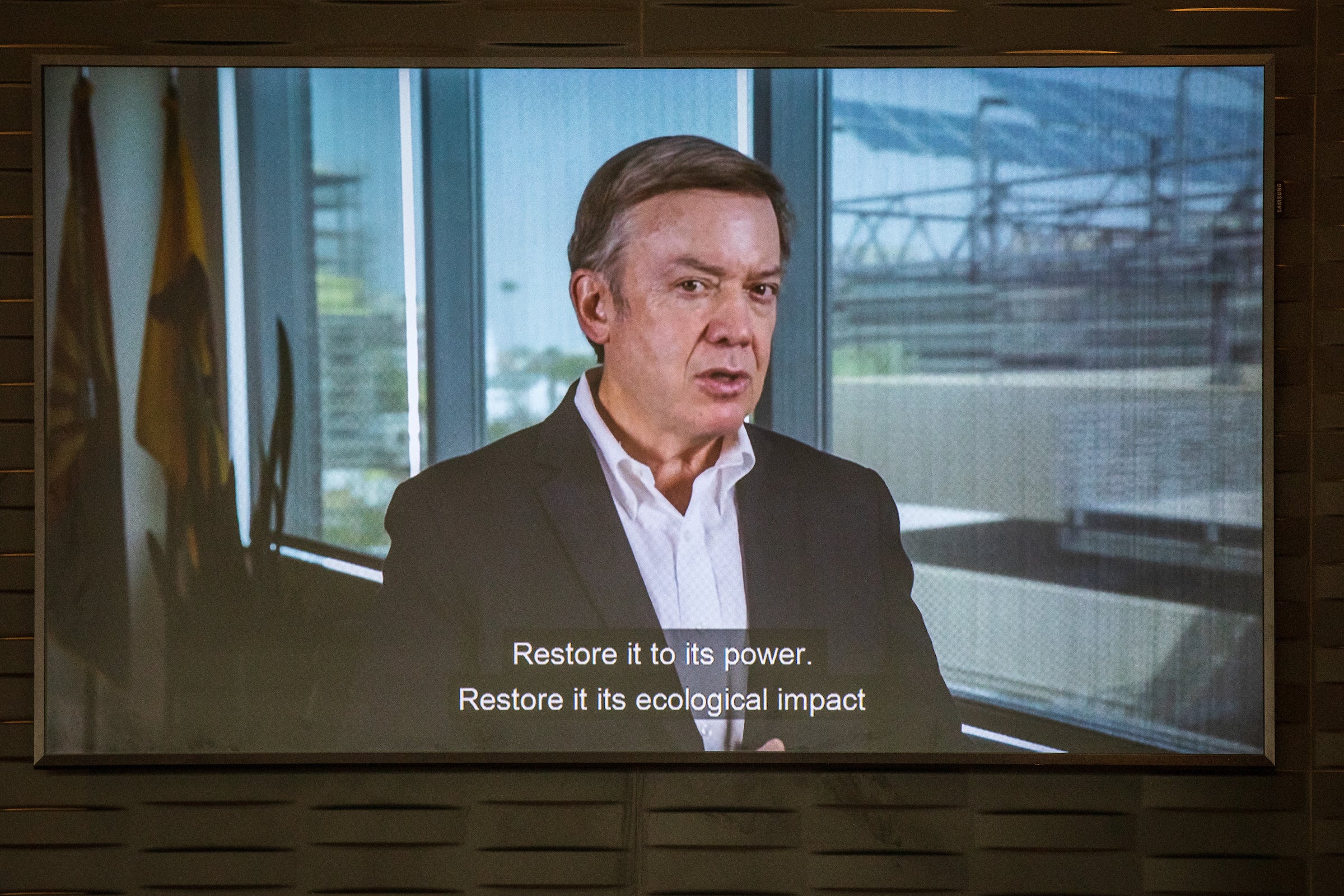 man speaking via remote conference