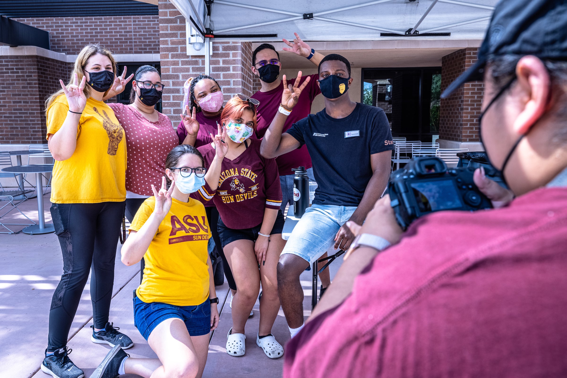 students posing for photo during move-in