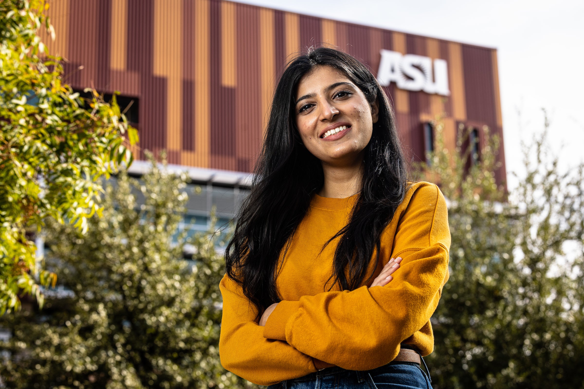 woman's portrait in front of ASU Cronkite School building