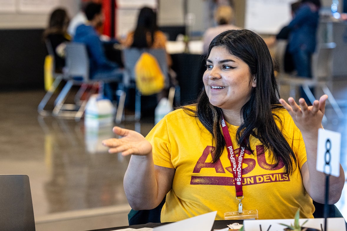 Maryvale High School graduate and second year medical micro biology student Kimberly Medina Rios shows her support for an ide