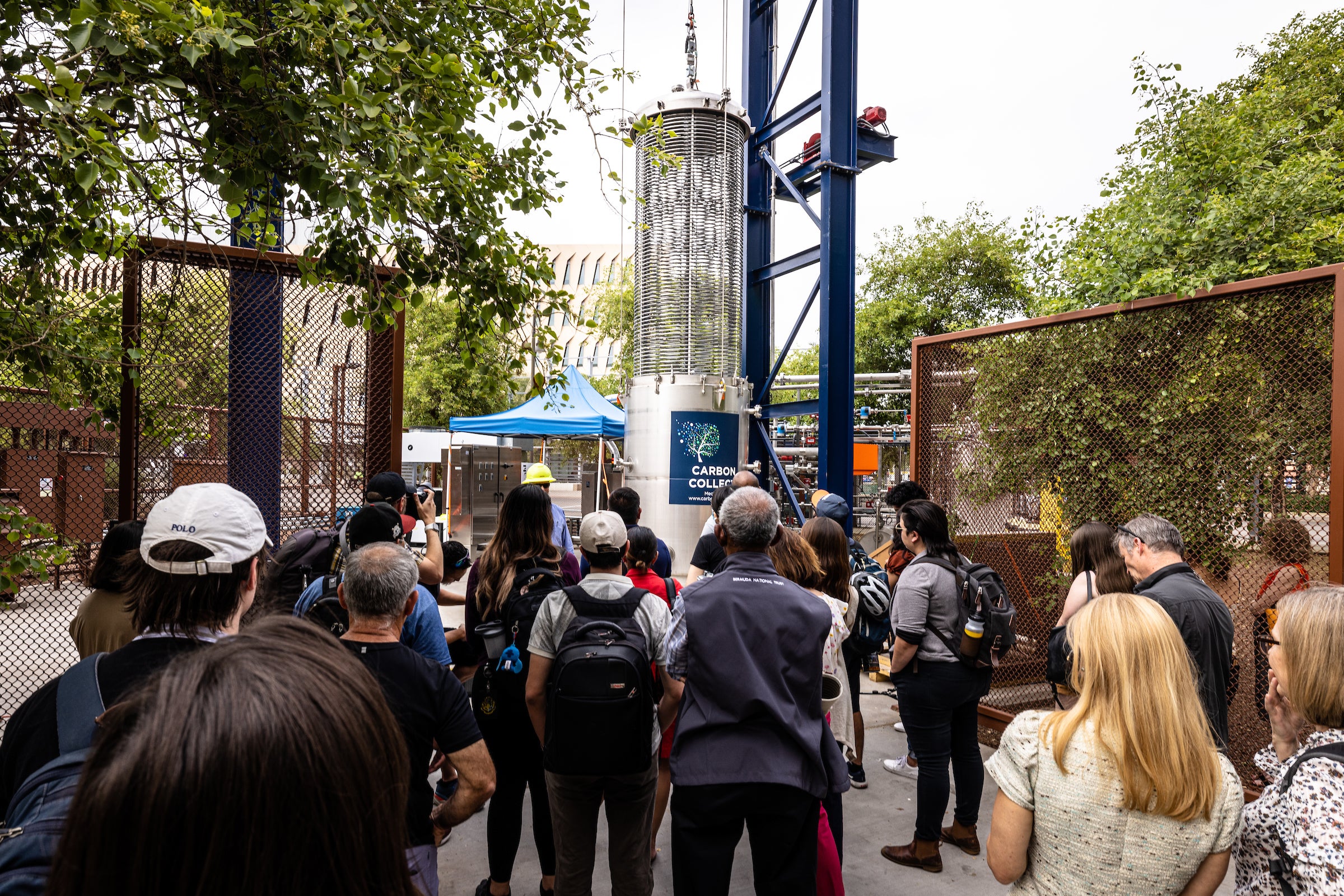 People looking at MechanicalTree prototype