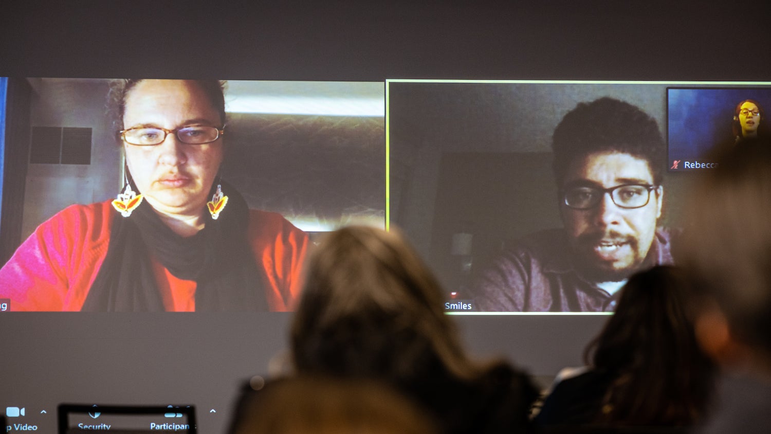 Two people on a screen