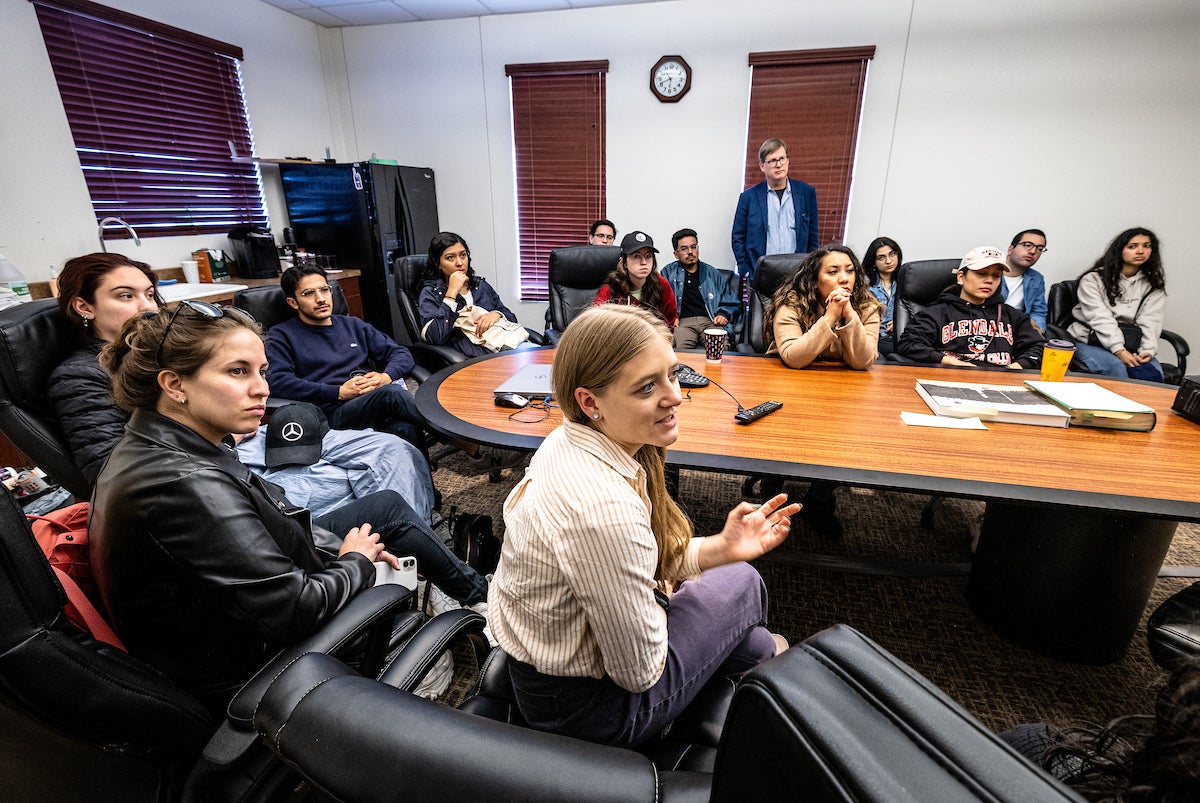 Students and staff at roundtable