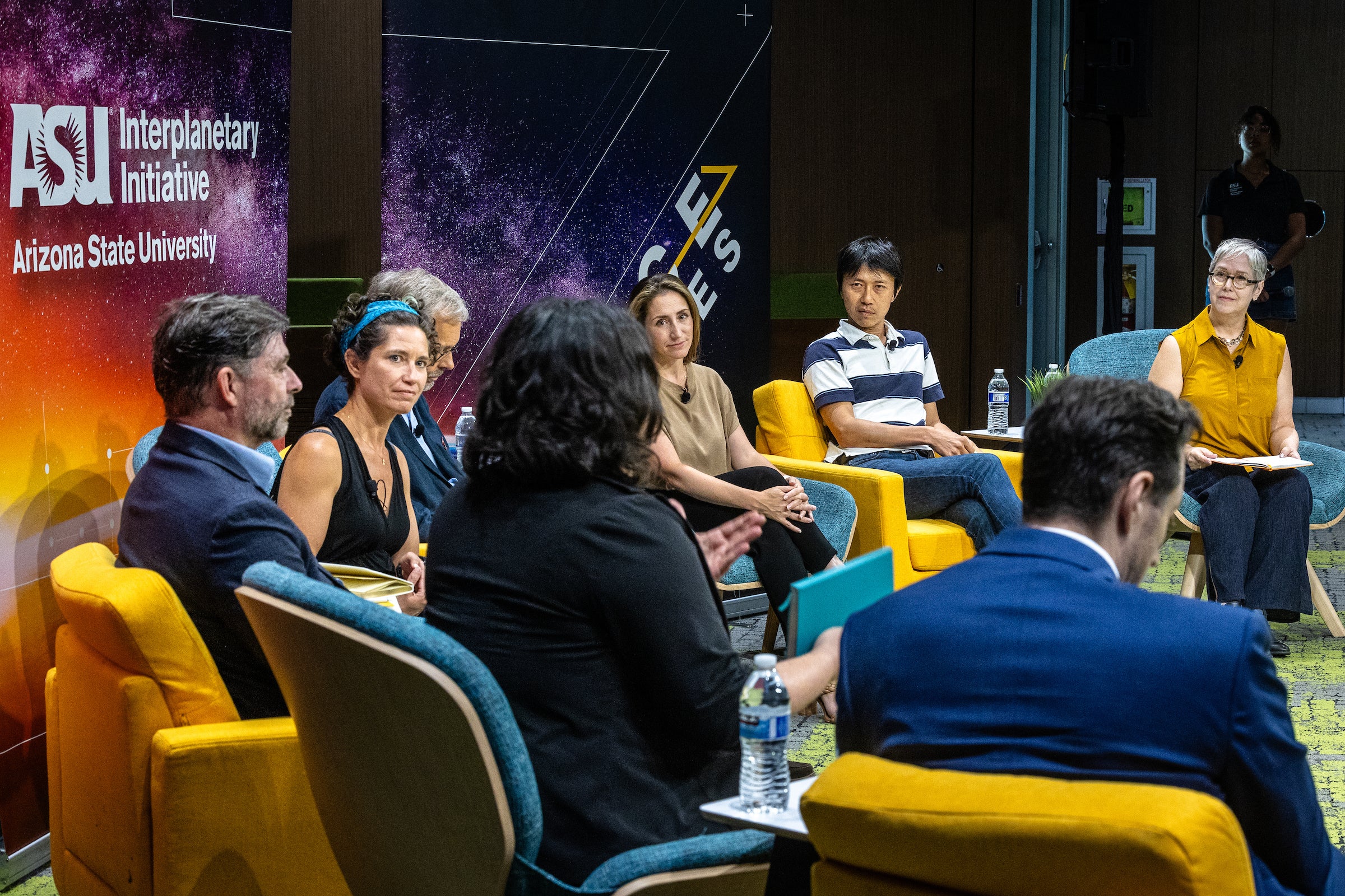 Group of people talking in panel