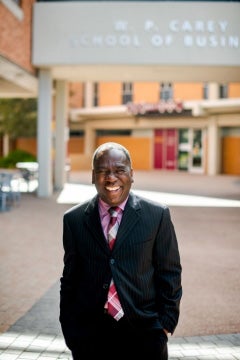 man's portrait on campus