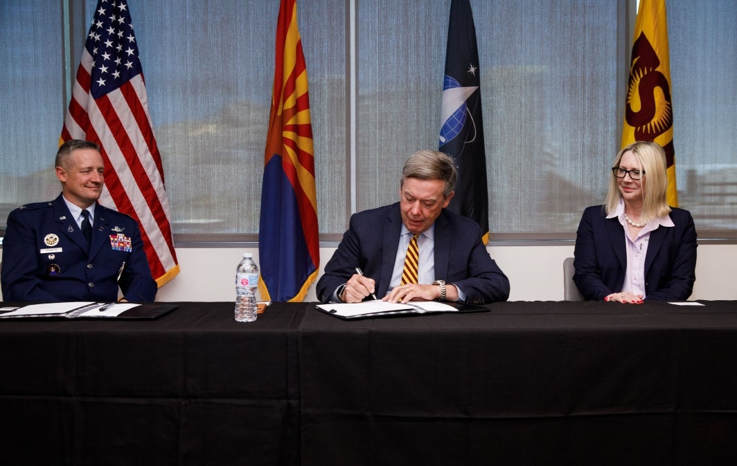 ASU President Michael Crow signs MOU