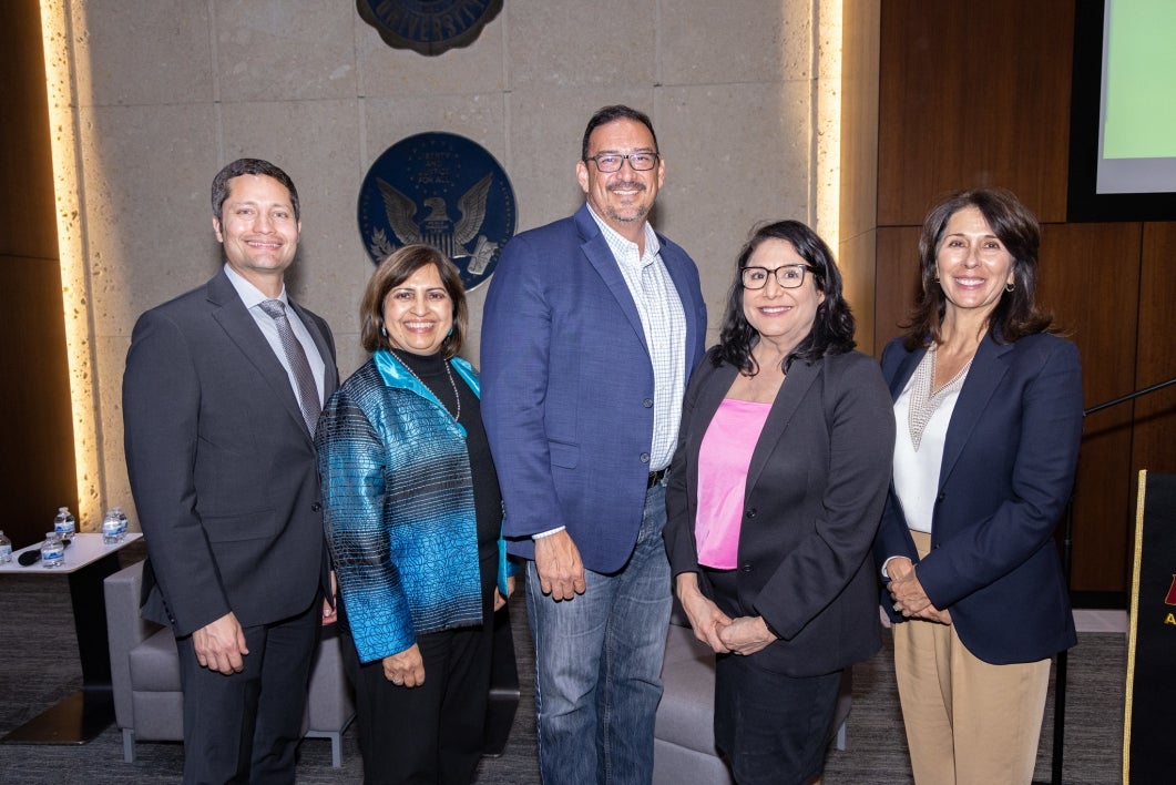 Secretary of State Adrian Fontes stands with ASU faculty and leadership.