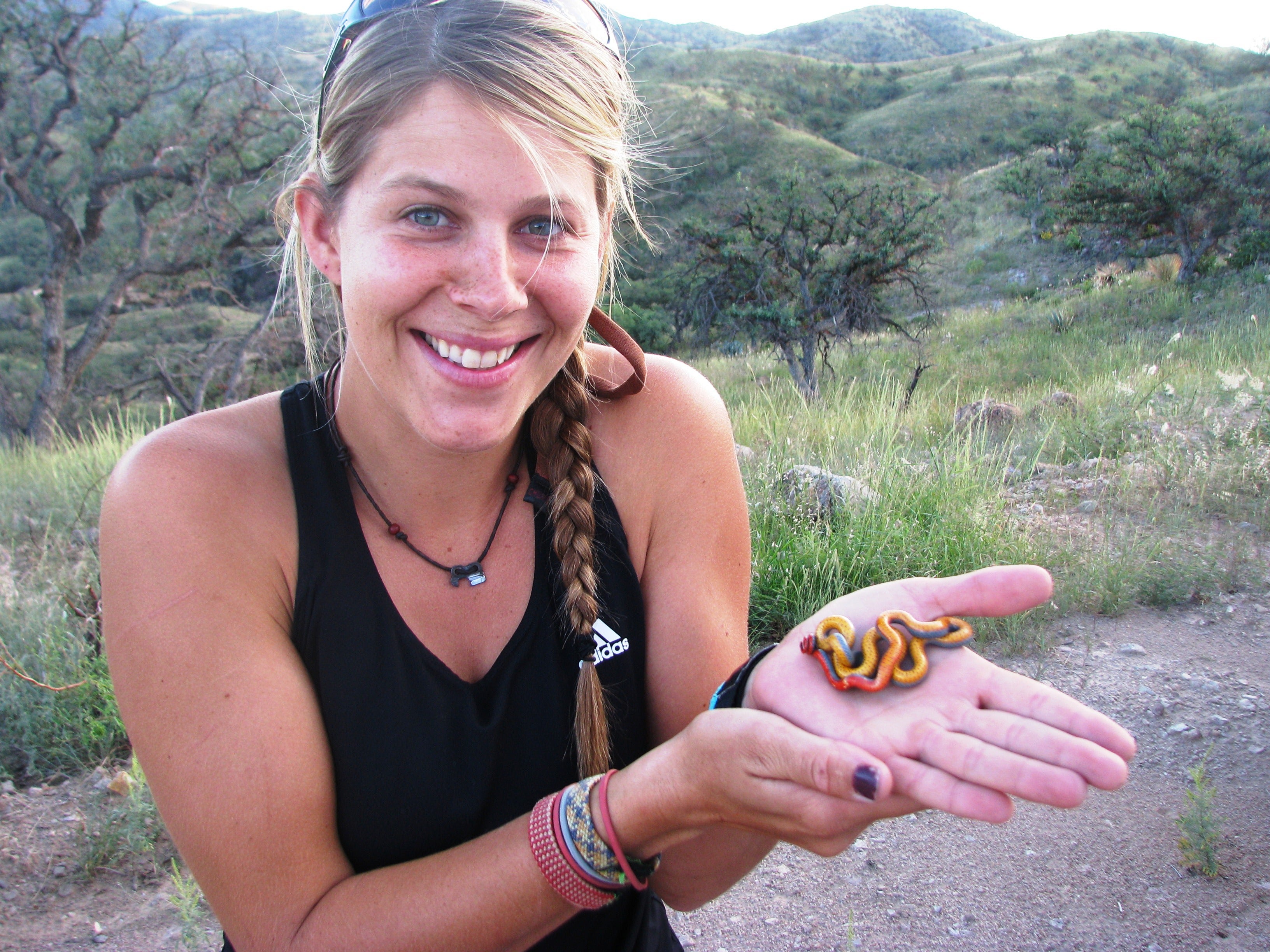 Woman holding a snake