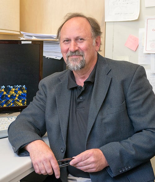 man at his desk