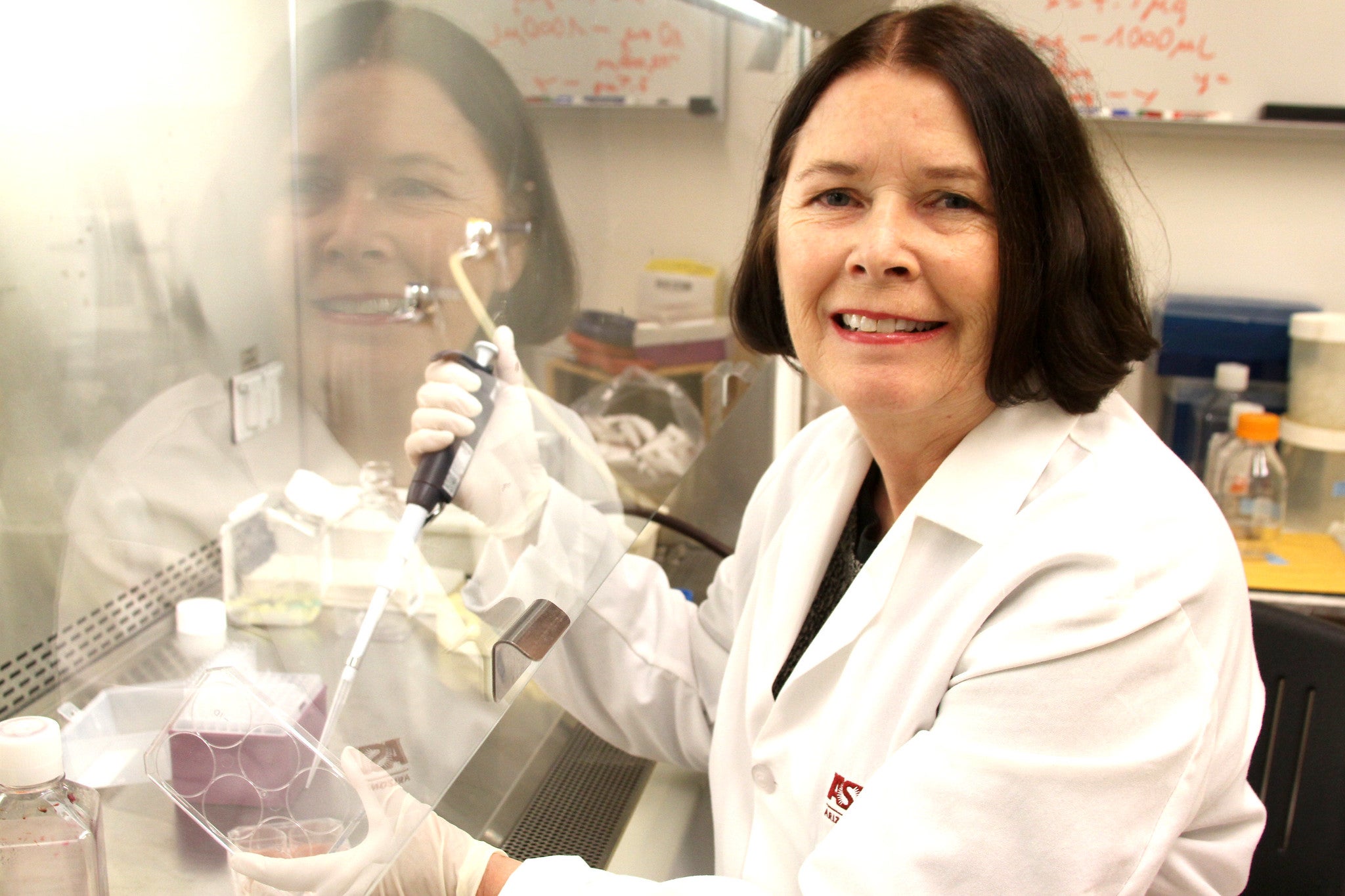 Woman in lab coat