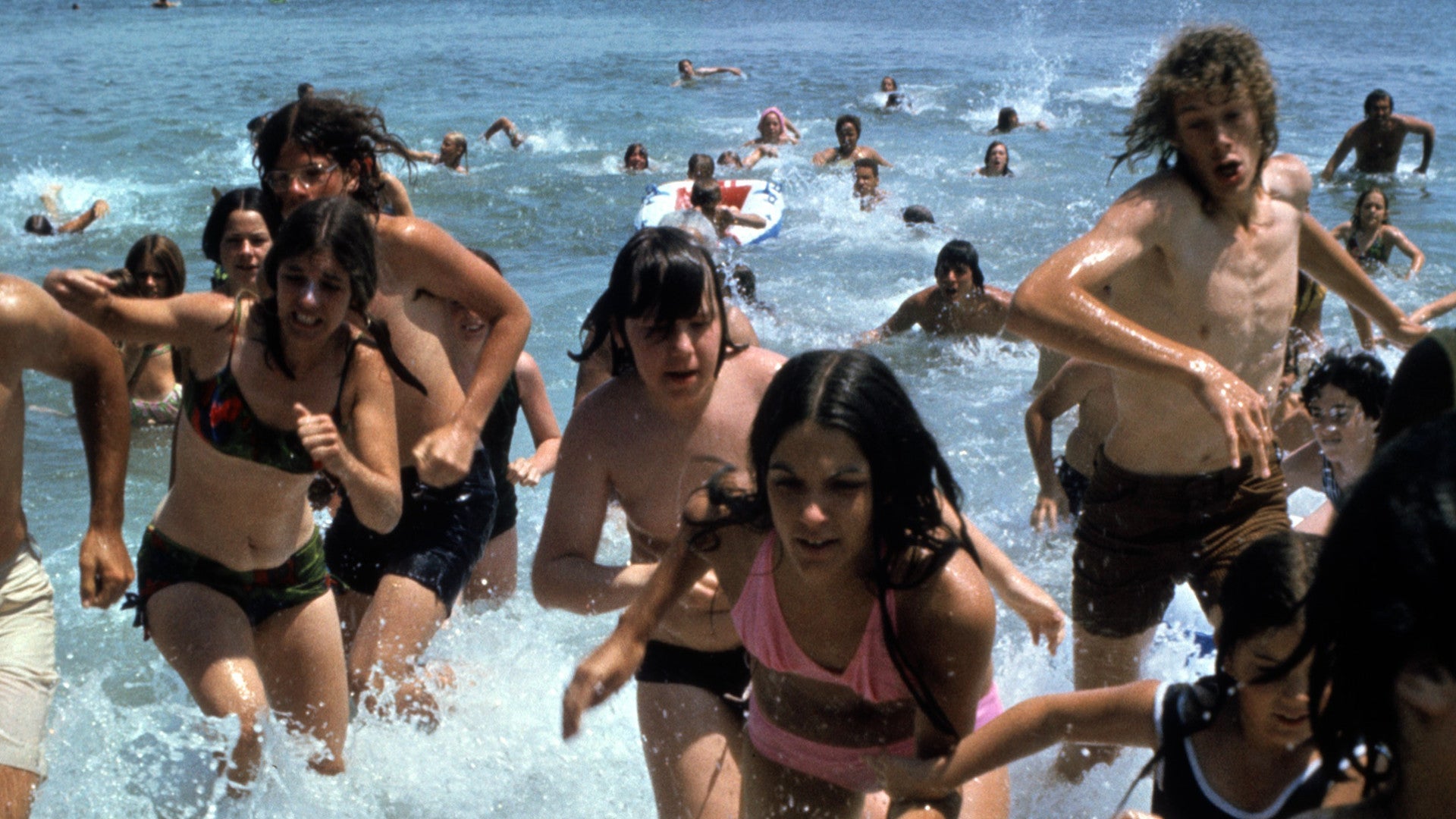 People running at the beach