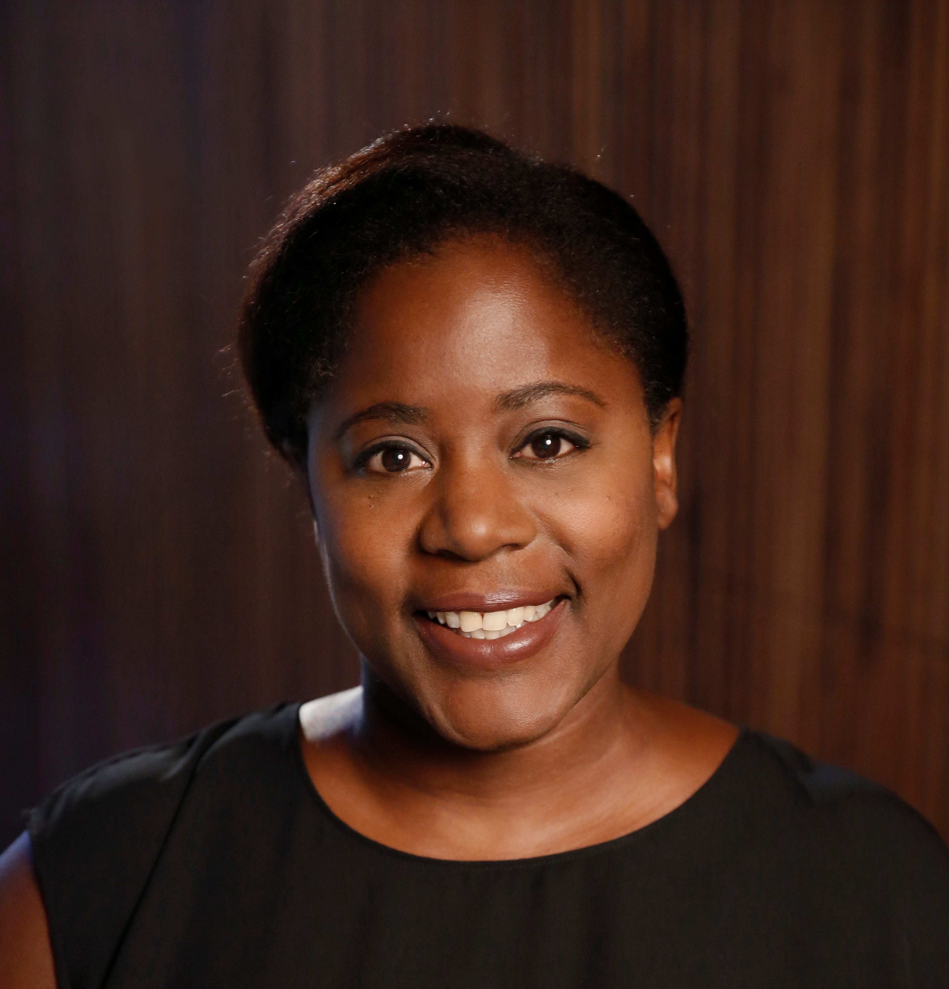 Woman in black shirt smiling