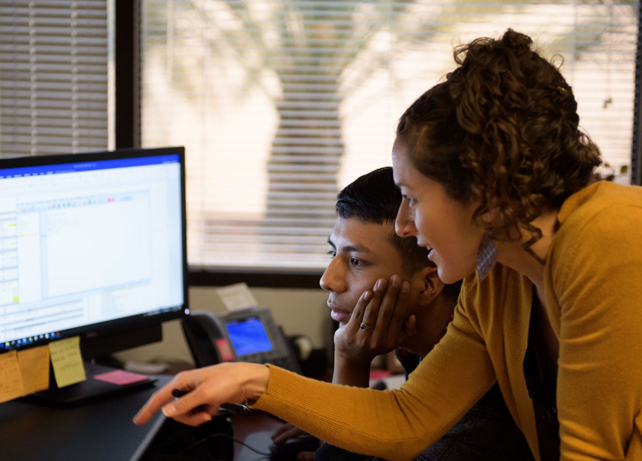 Students work on a computer