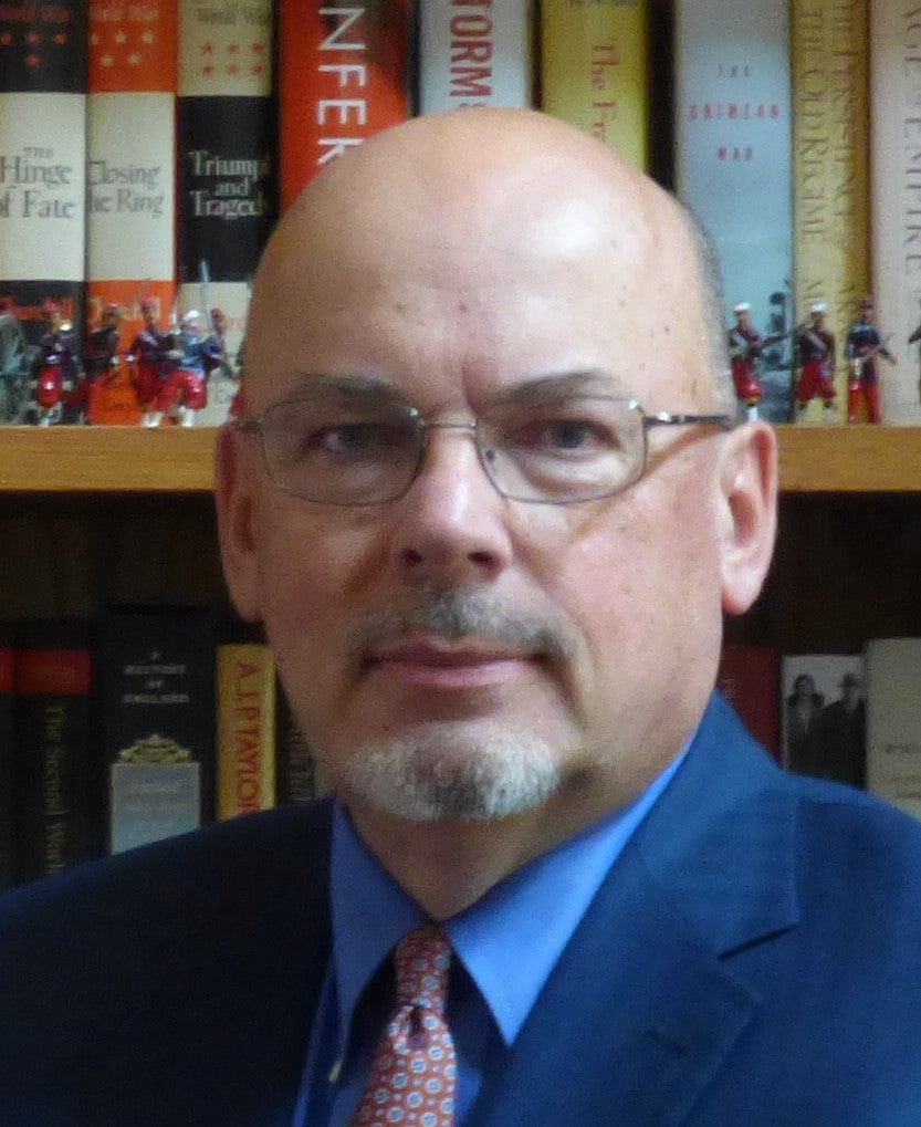 Man in glasses and tie