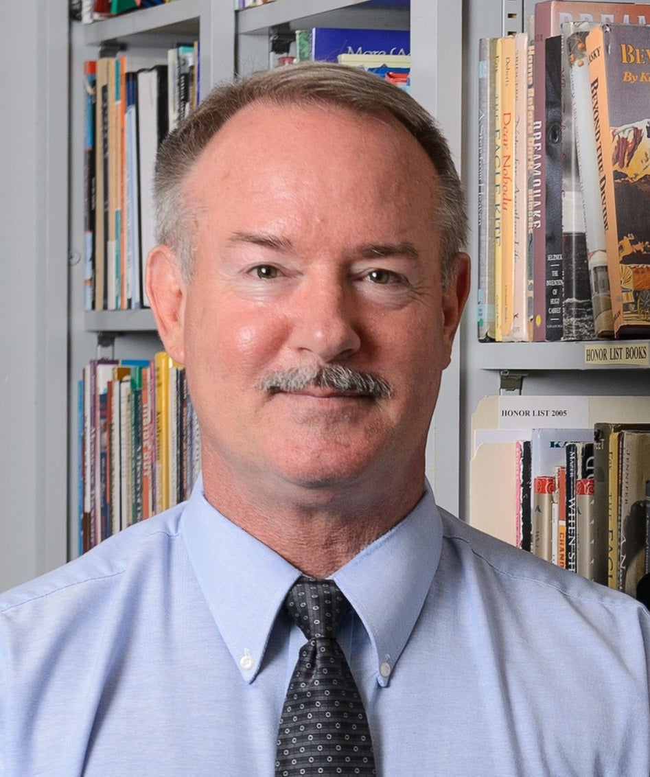 Man in blue shirt and tie