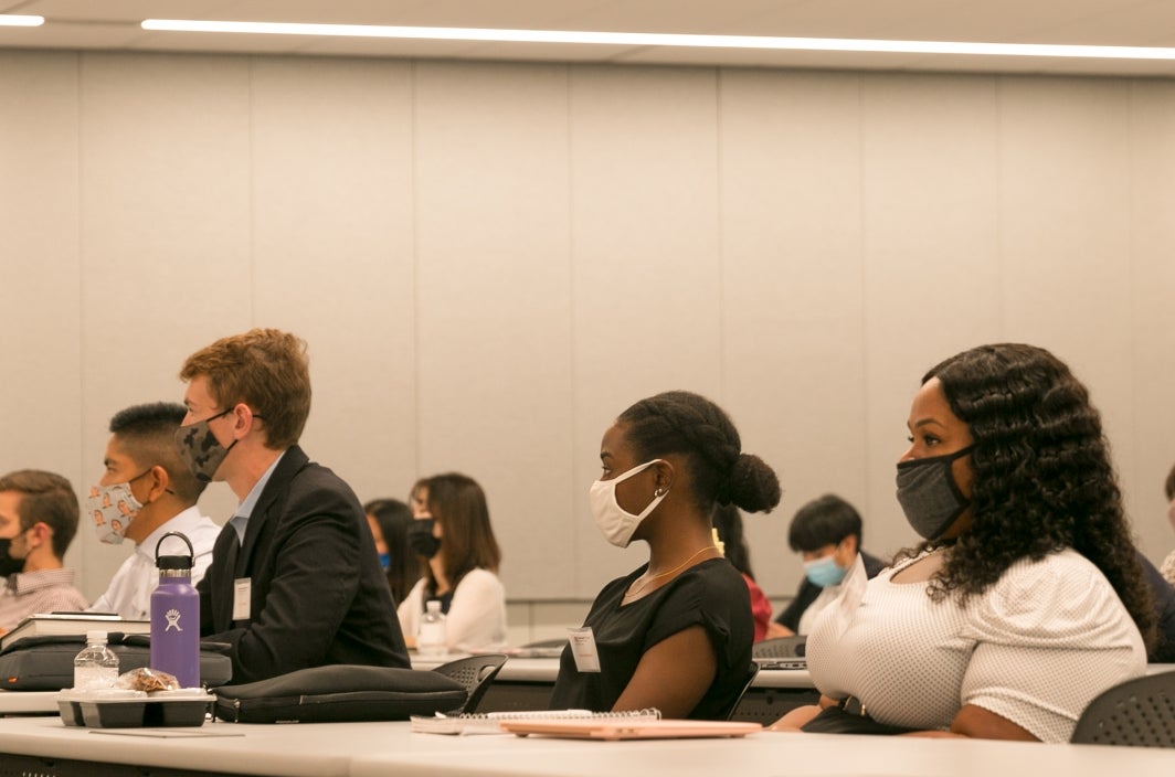 Photo of ASU Law Advance Program students listening to Professor Amy Langenfeld