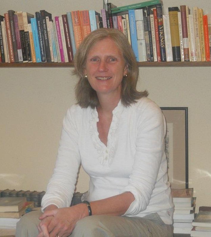 woman sitting with books