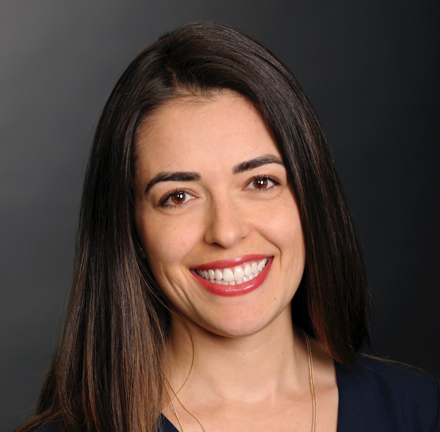 Woman in black shirt smiling