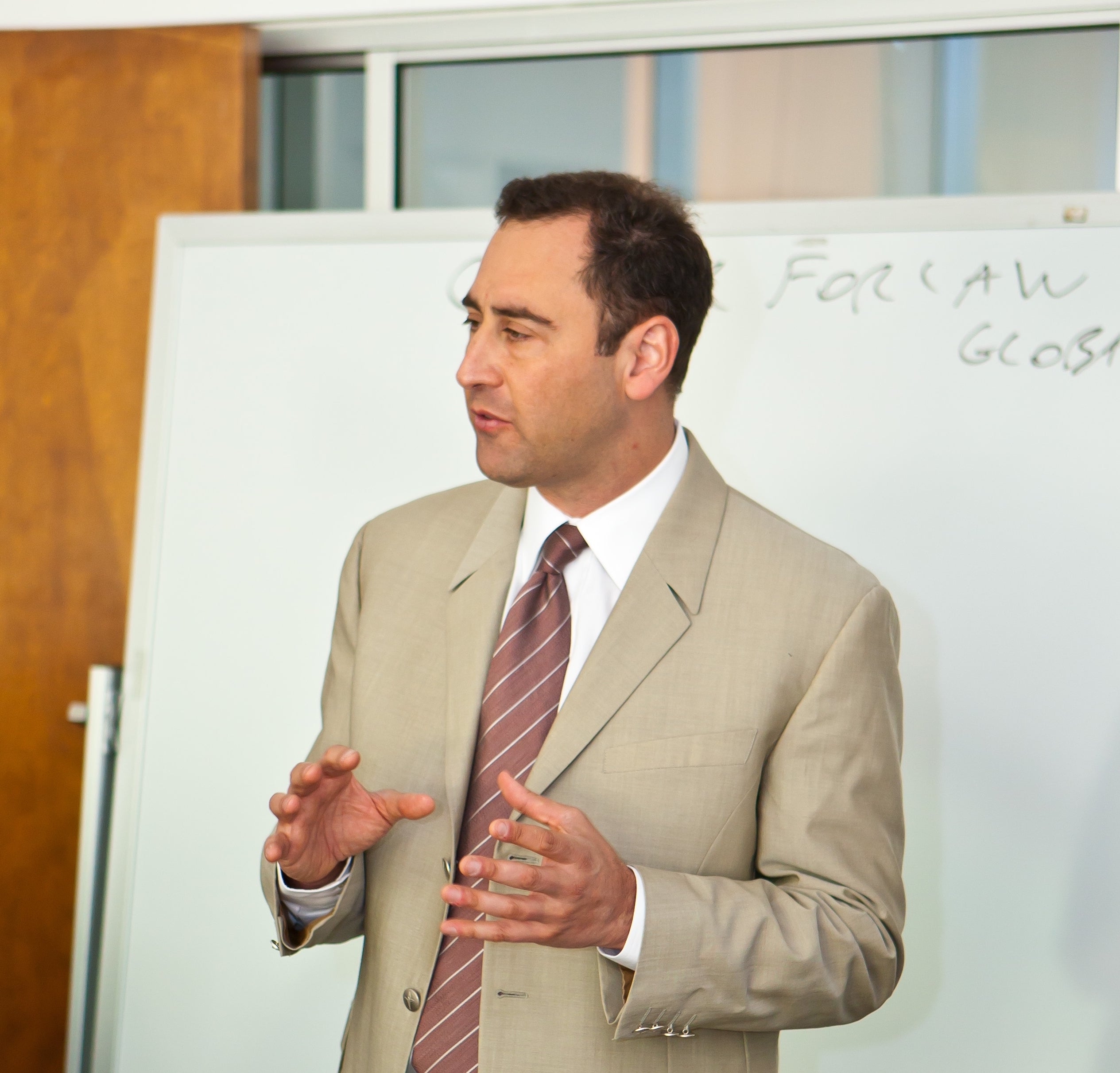 Man in beige suit