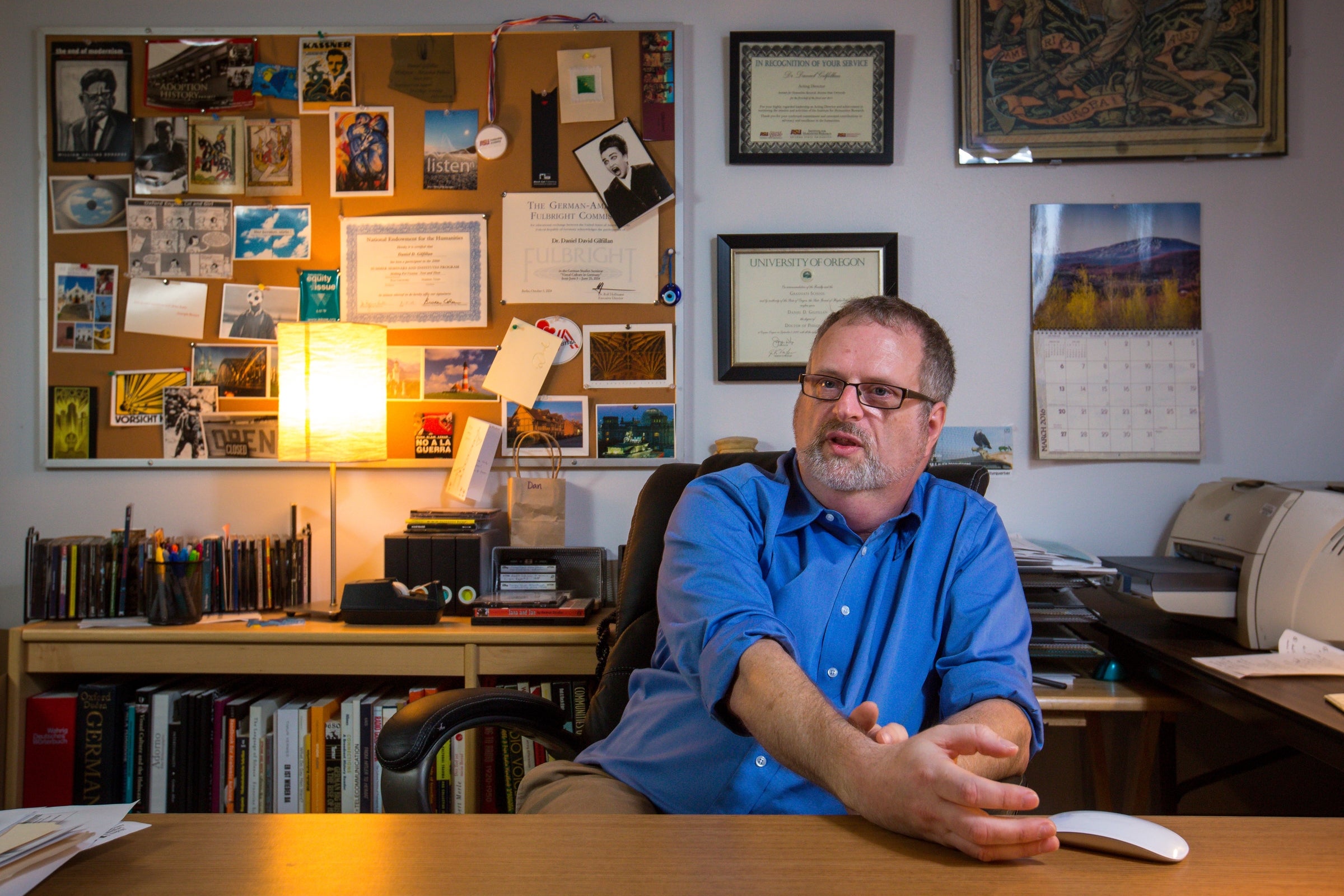 man sitting at desk