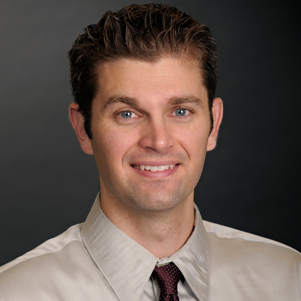 Man smiling in tie