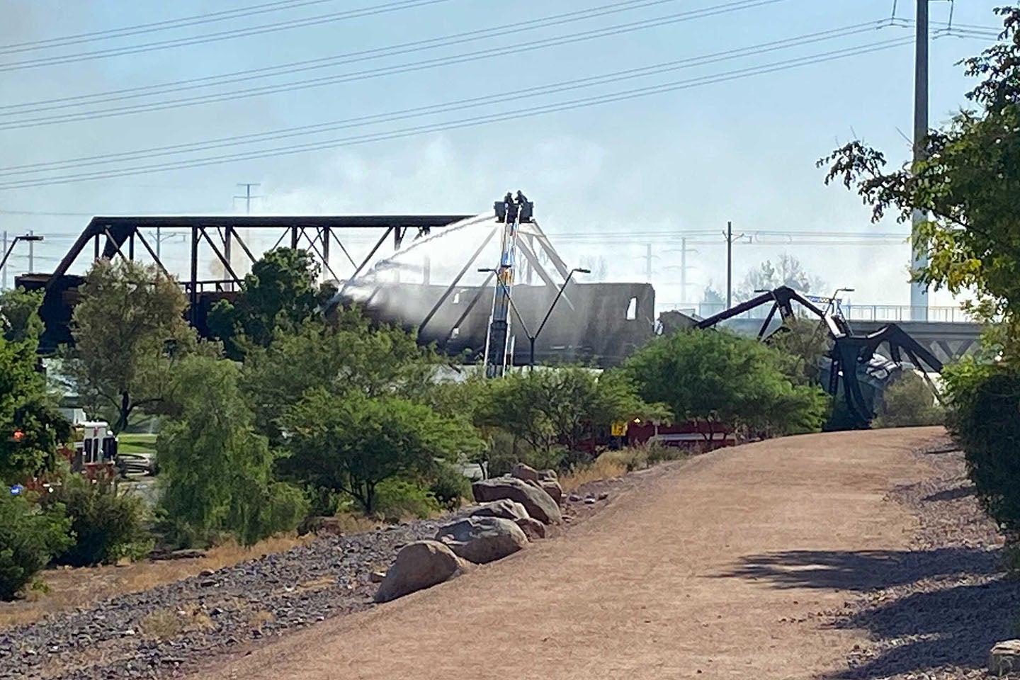 Three derailed cars landed in the empty park below following the Salt River Bridge train Derailment on July 29.