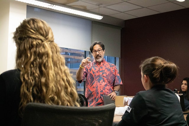 Fredi Lajvardi talks to the ASU women's underwater robotics team