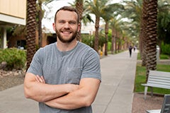 man standing on ASU's Palm Walk