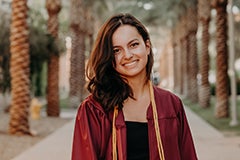 woman posing for photo on Palm Walk