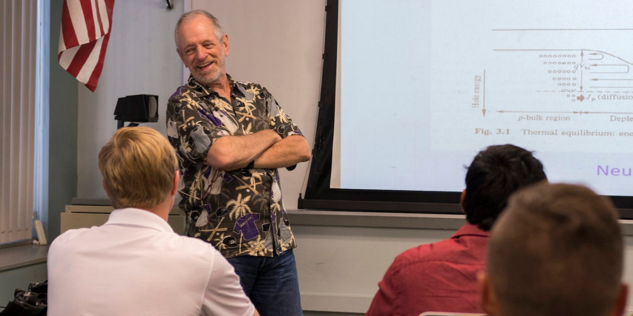 man teaching class