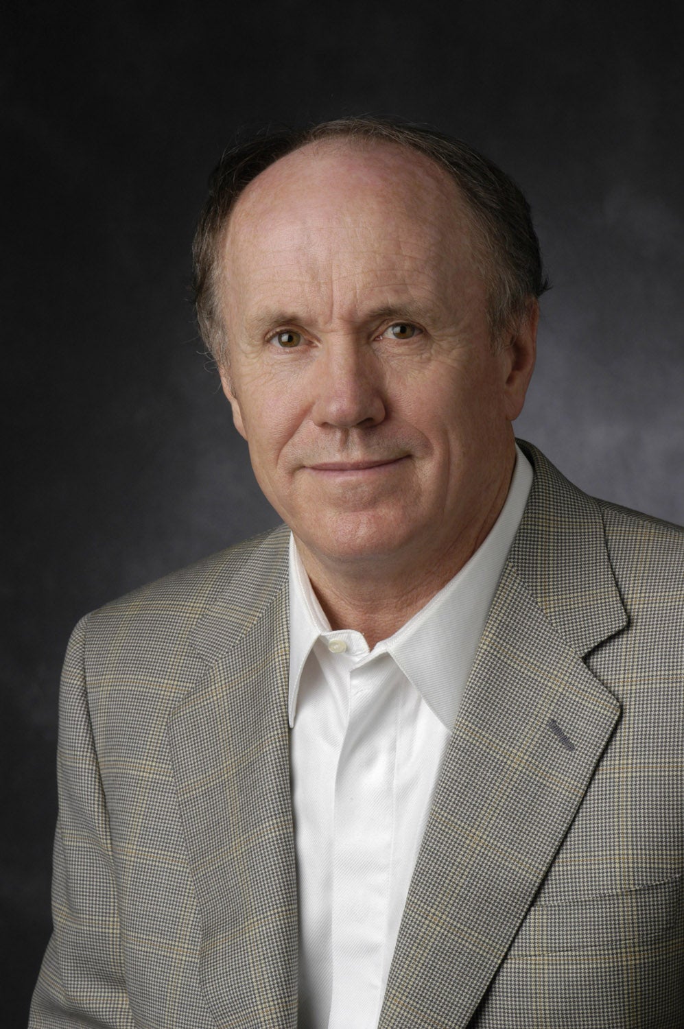 Portrait of older man in suit jacket