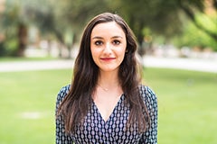 woman posing for portrait on lawn