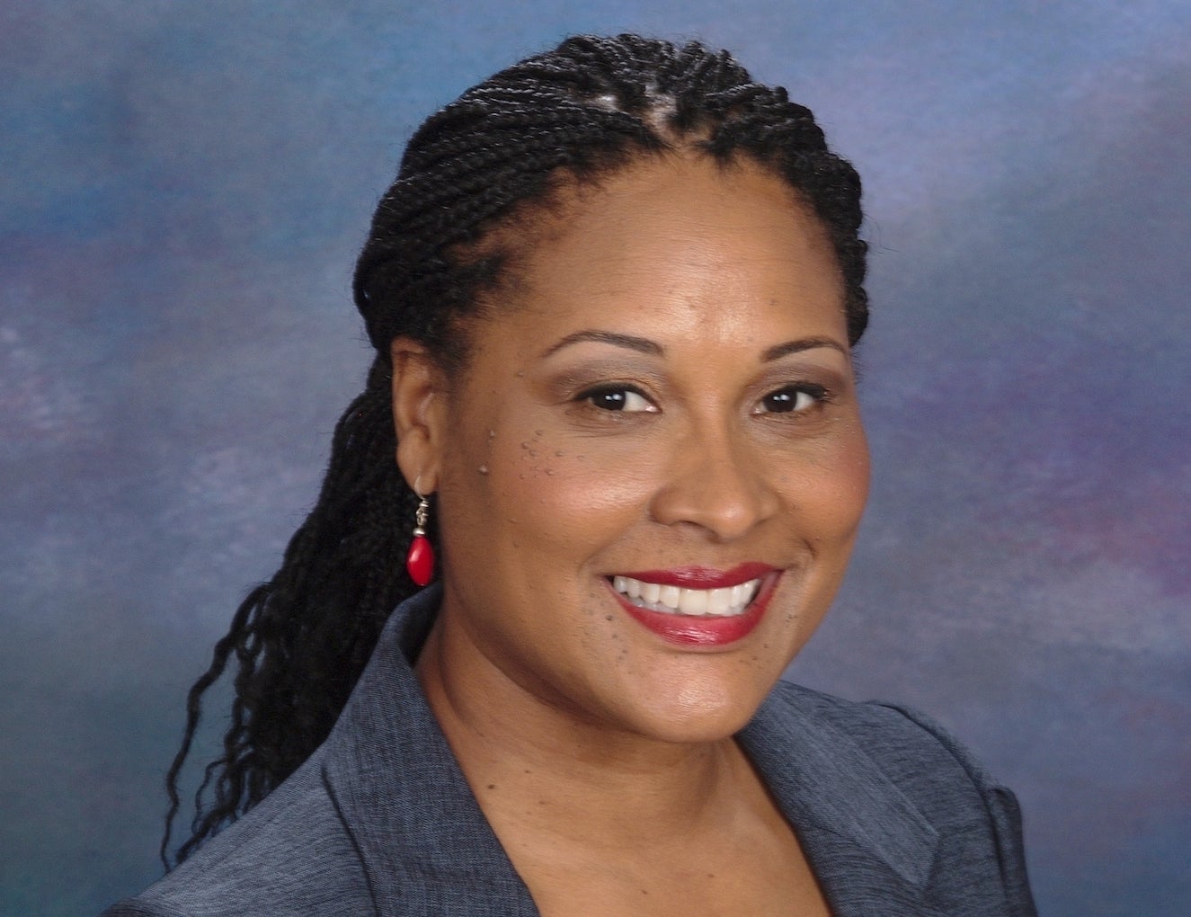 Woman in braids smiling